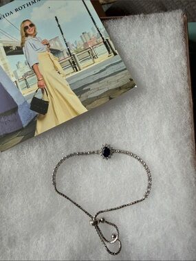 Elegant Silver Bracelet with Deep Blue Center Stone